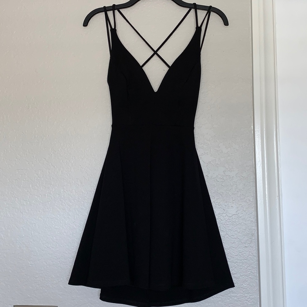 Backless black mini dress
